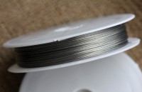 Ювелирный тросик 030-50 Ланка Струна 0,30мм цвета платины (серебристый) (катушка ок. 50м)