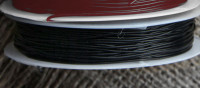 Резинка 20 силиконовая круглая 0,6мм чёрная (катушка ок.15м)