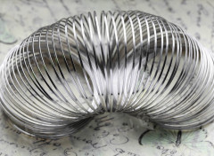 Мемори проволока - пружина - основа для браслета плоская 55*1,2*0,5мм цвет платины (10 витков)