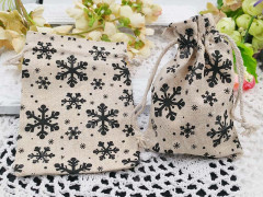 Мешочек холщовый 05 14*10см св.коричневый со снежинками (ткань) (упаковка для украшений)