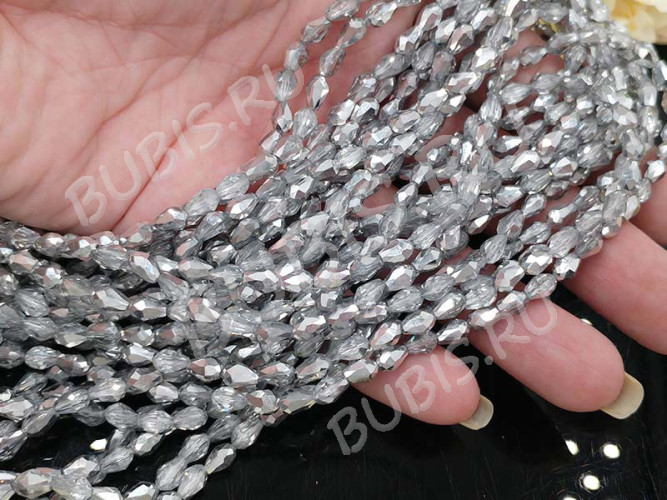 (ОПТ) Бусина Капля гранёная 6*4*4мм прозрачно-серебристая (имитация Сваровски) (НИТЬ)