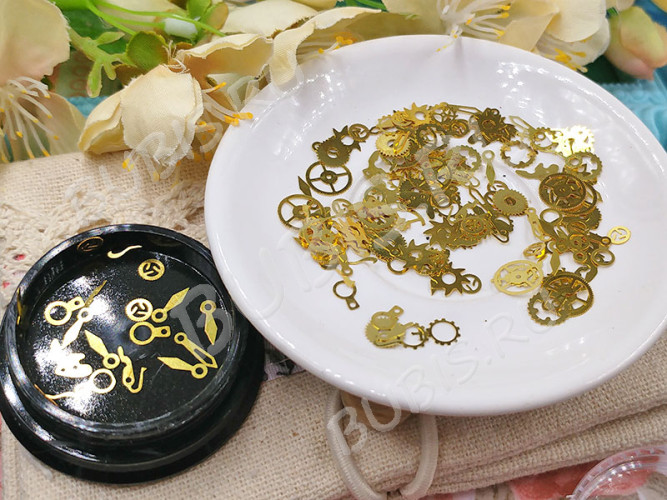 Наполнение для смолы и бутылочек 077 фигурки Шестерёнки и механизмы микс 3-8*0,1мм золотистые в контейнере (декор)