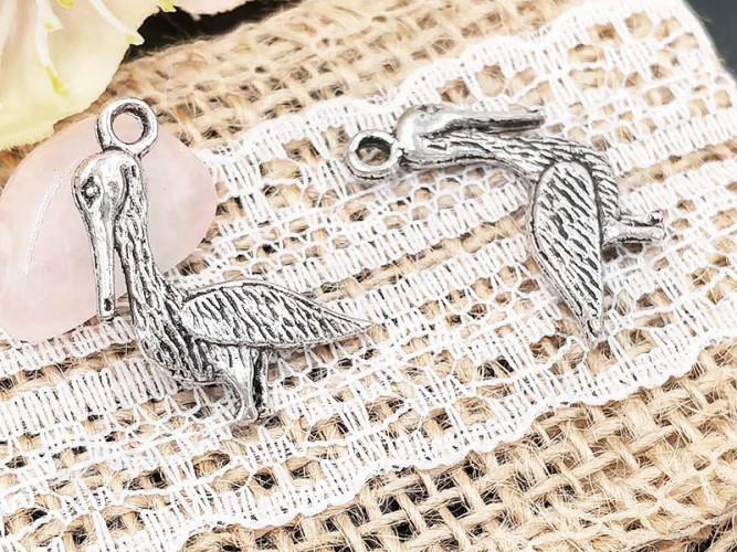 Подвеска Птичка 04 двусторонняя Пеликан 23,5*13*2,5мм античное серебро (литьё)