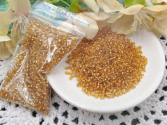 Бисер для проставок 07 1,5-2,5мм прозрачный с золотистой серединкой (стекло) (15г)