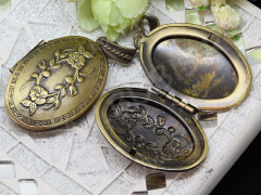 Подвеска Медальон 10 Овал с цветами 42*27*10мм античная бронза (Brass)