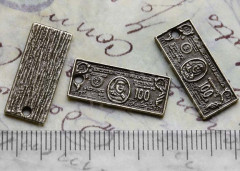 Подвеска Доллар 03 купюра 100 баксов 20,8*9*1мм античная бронза (литьё)