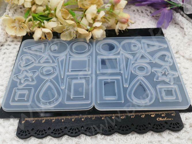 Молд 148 для эпоксидной смолы 11,8*9,8*4,5мм Подвески кулоны микс (силикон)