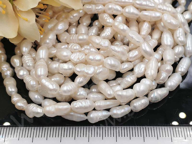 (ОПТ) Бусина Жемчуг 42 речной овальный 7-9*4-5мм натуральный (камни) (нить 33см)