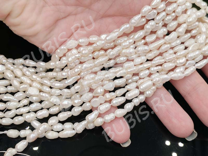 (ОПТ) Бусина Жемчуг 42 речной овальный 7-9*4-5мм натуральный (камни) (нить 33см)