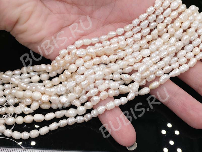 (ОПТ) Бусина Жемчуг 43 речной овальный 5-7*4-5мм натуральный (камни) (нить 33см)