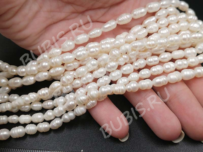 (ОПТ) Бусина Жемчуг 29 пресноводный овальный 7-8*5-6мм натуральный (камни) (нить 33-34см)