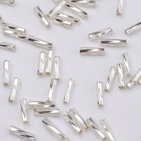 Бусина стеклянная Трубочка 12*2мм бисер стеклярус витой серебристый (стекло) (ок.130шт)