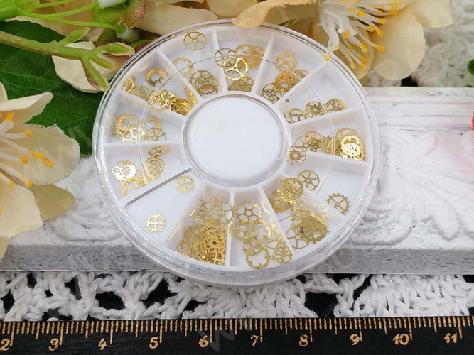 Наполнение для смолы и бутылочек 050 фигурки Шестерёнки микс 4-6*0,1мм золотистые в контейнере (декор)