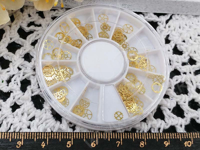 Наполнение для смолы и бутылочек 050 фигурки Шестерёнки микс 4-6*0,1мм золотистые в контейнере (декор)