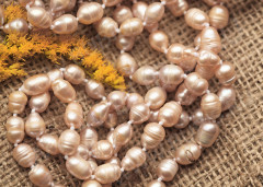 Бусина Жемчуг речной овальный 8-9*6-7мм персиковый (камни)