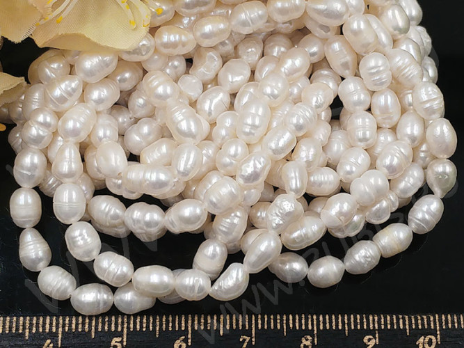 (ОПТ) Бусина Жемчуг 45 речной овальный 5,5-6,5*4,5-5мм натуральный (камни) (нить 33-34см)