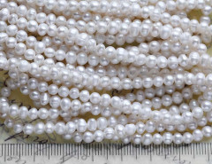 (ОПТ) Бусина Жемчуг 08 пресноводный уплощённый 3,5-4мм натуральный (камни) (нить 35-37см)