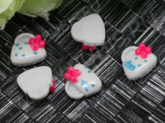 Кабошон декоративный 02 Сумочка 10,5*10,5*4,5мм бело-розовая непрозрачная (резин)