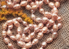 (ОПТ) Бусина Жемчуг 01 речной овальный 8-9*6-7мм персиковый (камни) (нить 43-45см)