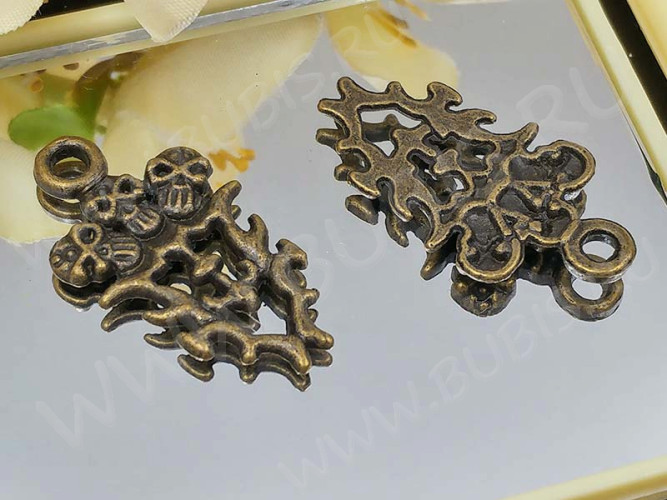 Подвеска 3 черепа 02 28*15,5*2мм античная бронза (литьё)
