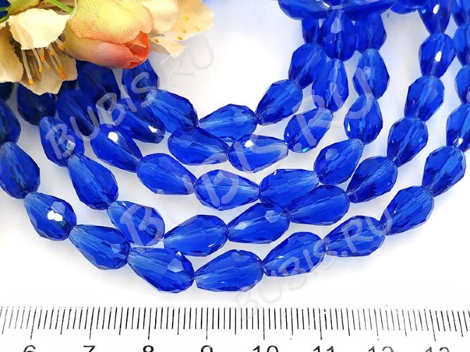 Бусина Капля гранёная 12*8*8мм т.голубая прозрачная (имитация Сваровски)