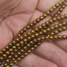 Купить (ОПТ) Бусина округлая 4мм Гематит т.золотистый (камни) (НИТЬ) с доставкой по России