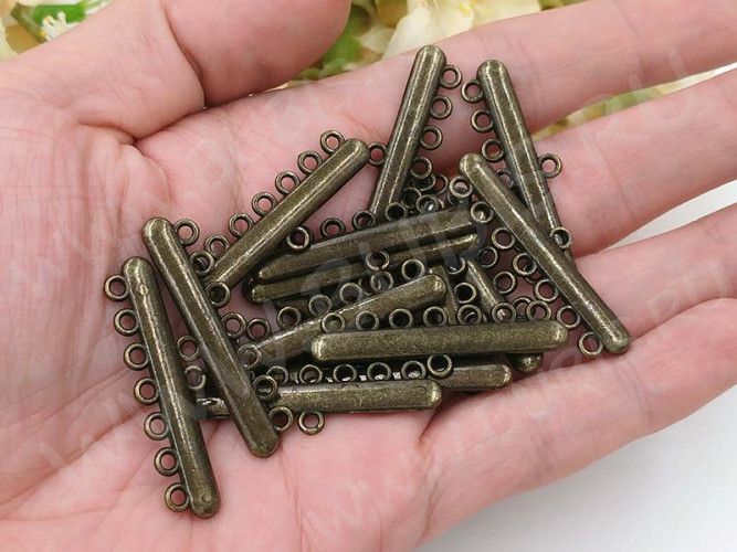 314 Коннектор классика на 7 нитей 37,5*11*2,5мм античная бронза (литьё)