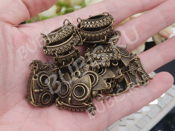 Подвеска Сова 52 подвижная 48*23*4мм античная бронза (литьё)