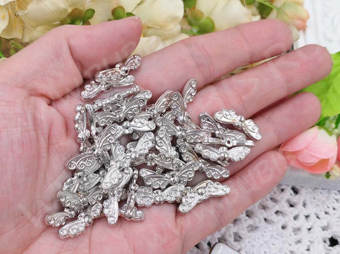 Бусина 183 Крылья 06 3D с завитками 22*7*3мм серебристые (литьё)