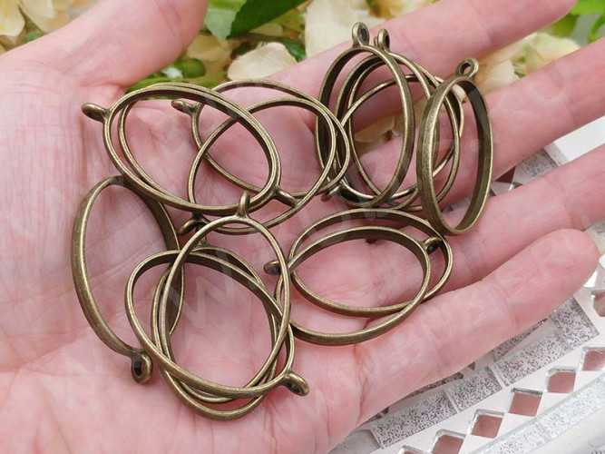 Подвеска Рамка 01 овал 39*24*5,8мм античная бронза (литьё)