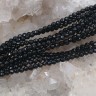 (ОПТ) Бусина округлая ГРАНЁНАЯ "каменный бисер" 2мм Шпинель черная (камни LUX) (НИТЬ) Купить (ОПТ) Бусина округлая ГРАНЁНАЯ "каменный бисер" 2мм Шпинель черная (камни LUX) (НИТЬ) с доставкой по России