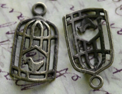Подвеска Клетка 04 полуклетка с птичкой 27*14*4,3мм античная бронза (литьё)