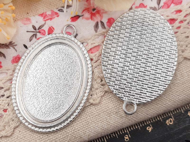 Подвеска-сеттинг Овал 45 (сеттинг 30*20мм) 44*29,5*2,3мм серебристый (литьё)